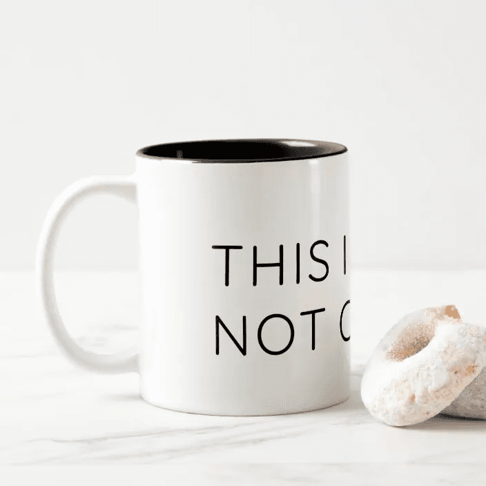 'This Is Not Optimal' printed on a mug